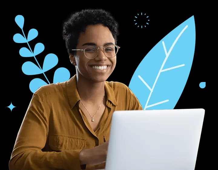 Smiling lady using laptop